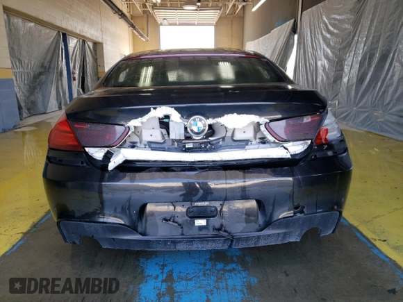2015 BMW 6 Series 640i z VIN WBA6A0C53FGB53650, wystawiony jako Copart lot #68653574 z przebiegiem Nie podano mil oraz Czysty tytuł • Clean title. Historia ofert i sprzedaży dostępna na DreamBid. Obrazek 6.