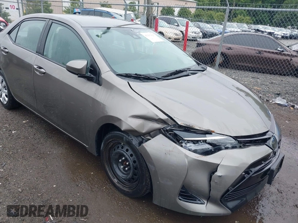 2018 Toyota Corolla L with VIN 2T1BURHE9JC990834, listed as a IAAI auction lot 42583027 with 217,143 mi miles and . Bid and sale history available at DreamBid. Image 6.