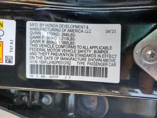 2023 Honda Civic Sport with VIN 19XFL2H82PE013762, listed as a Copart auction lot 52256325 with 26,532 mi miles and Salvage Title. Bid and sale history available at DreamBid. Image 12.