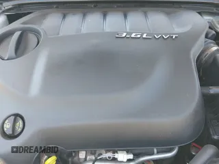 2012 Dodge Avenger SE z VIN 1C3CDZAG5CN313011, wystawiony jako IAAI lot #42413431 z przebiegiem 148 308 mil mil oraz . Historia ofert i sprzedaży dostępna na DreamBid. Obrazek 12.