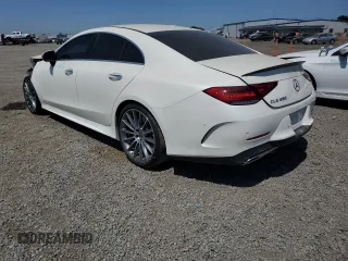2021 Mercedes-Benz CLS 450 with VIN W1K2J5JB7MA087033, listed as a Copart auction lot 63196523 with 21,675 mi miles and . Bid and sale history available at DreamBid. Image 2.
