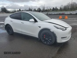 2022 Tesla Model Y Performance with VIN 7SAYGDEFXNF455517, listed as a Copart auction lot 44147905 with 32,210 mi miles and Salvage title. Bid and sale history available at DreamBid. Image 4.