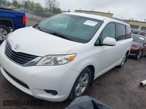 2012 Toyota Sienna LE AAS with VIN 5TDKK3DC3CS208853, listed as a IAAI auction lot 42205012 with 197,286 mi miles. Bid and sale history available at carsss.com. Image 2.