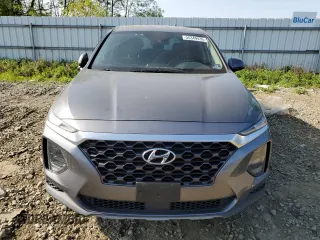 2019 Hyundai Santa Fe SE z VIN 5NMS2CAD2KH130516, wystawiony jako Copart lot #55349435 z przebiegiem 63 760 mil mil oraz Szkoda całkowita • Salvage title. Historia ofert i sprzedaży dostępna na DreamBid. Obrazek 5.