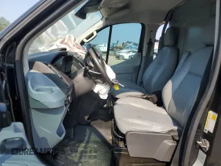 2016 Ford Transit Cargo with VIN 1FTYE1YM5GKA62641, listed as a Copart auction lot 65886804 with 130,906 mi miles and Salvage Title. Bid and sale history available at DreamBid. Image 7.
