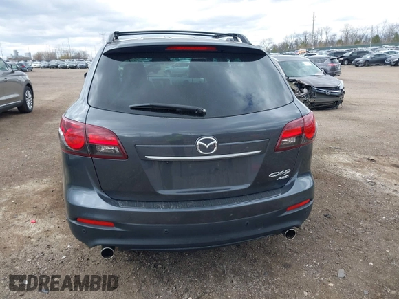 2015 Mazda CX-9 Grand Touring with VIN JM3TB3DV1F0465966, listed as a IAAI auction lot 42049749 with 74,470 mi miles and . Bid and sale history available at DreamBid. Image 16.