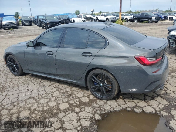 2022 BMW 3 Series M340i xDrive with VIN WBA5U9C07NFM06921, listed as a Copart auction lot 64725683 with 16,994 mi miles and . Bid and sale history available at DreamBid. Image 2.