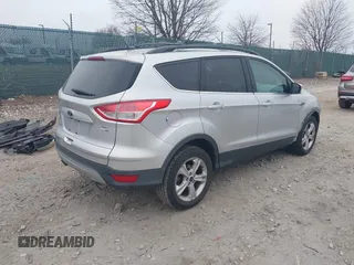 2016 Ford Escape SE with VIN 1FMCU9GX3GUB65337, listed as a IAAI auction lot 41767376 with 99,092 mi miles. Bid and sale history available at carsss.com. Image 4.