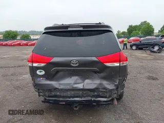 2014 Toyota Sienna XLE with VIN 5TDYK3DC0ES436502, listed as a IAAI auction lot 42180990 with 154,839 mi miles and . Bid and sale history available at DreamBid. Image 17.