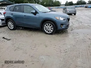 2015 Mazda CX-5 Grand Touring with VIN JM3KE2DY4F0526671, listed as a Copart auction lot 46520505 with 129,017 mi miles and Salvage Title. Bid and sale history available at carsss.com. Image 14.