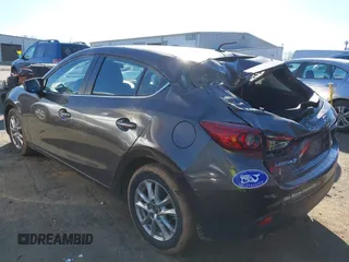 2014 Mazda 3 i Touring with VIN JM1BM1L70E1109815, listed as a IAAI auction lot 41611536 with 98,860 mi miles and . Bid and sale history available at DreamBid. Image 3.