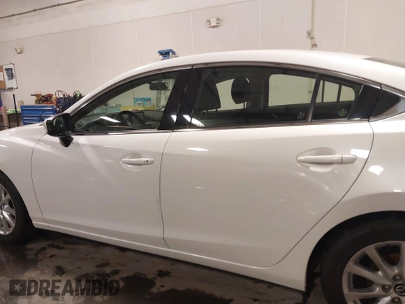 2016 Mazda Mazda6 i Sport with VIN JM1GJ1U54G1473671, listed as a IAAI auction lot 41576038 with 88,386 mi miles. Bid and sale history available at carsss.com. Image 15.