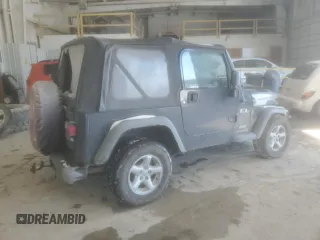 2004 Jeep Wrangler X with VIN 1J4FA39SX4P754012, listed as a Copart auction lot 45239915 with 160,473 mi miles and Salvage title. Bid and sale history available at DreamBid. Image 3.