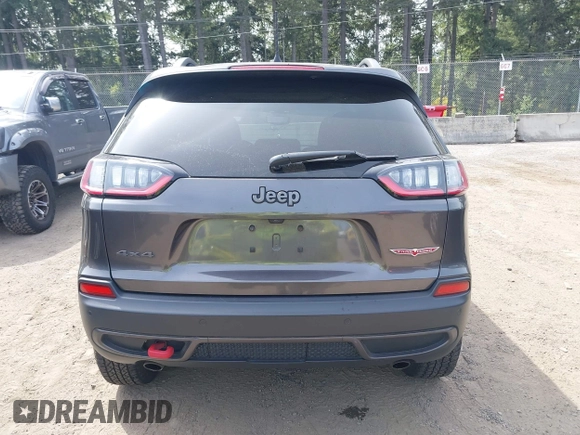 2019 Jeep Cherokee Trailhawk with VIN 1C4PJMBX2KD231734, listed as a IAAI auction lot 42235469 with 104,565 mi miles and . Bid and sale history available at DreamBid. Image 16.