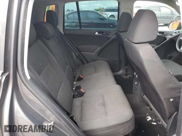2013 Volkswagen Tiguan S z VIN WVGAV3AX6DW597379, wystawiony jako Copart lot #56386515 z przebiegiem 100 415 mil mil oraz Czysty tytuł • Clean title. Historia ofert i sprzedaży dostępna na DreamBid. Obrazek 11.