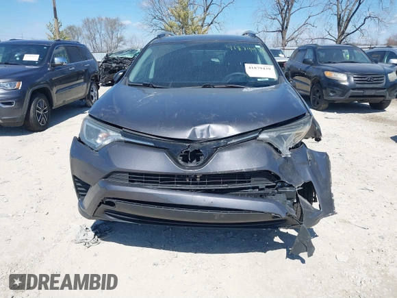 2016 Toyota RAV4 LE with VIN 2T3BFREV6GW482446, listed as a IAAI auction lot 41879439 with 144,693 mi miles. Bid and sale history available at carsss.com. Image 13.