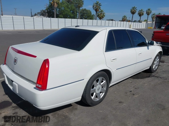 2007 Cadillac DTS Luxury I z VIN 1G6KD57Y77U133267, wystawiony jako IAAI lot #42337188 z przebiegiem 126 063 mil mil oraz . Historia ofert i sprzedaży dostępna na DreamBid. Obrazek 4.
