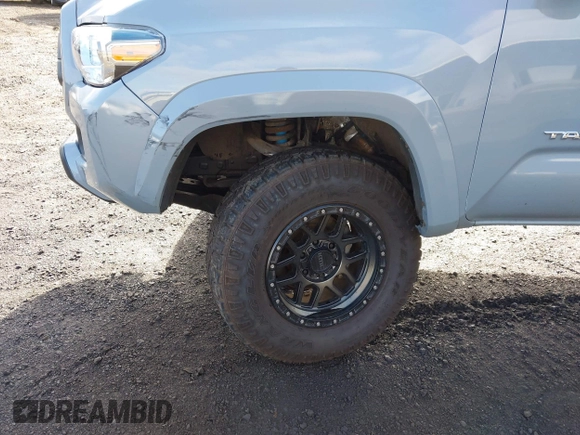 2020 Toyota Tacoma SR5 with VIN 3TMCZ5AN7LM366243, listed as a IAAI auction lot 41399117 with 58,126 mi miles and . Bid and sale history available at DreamBid. Image 6.