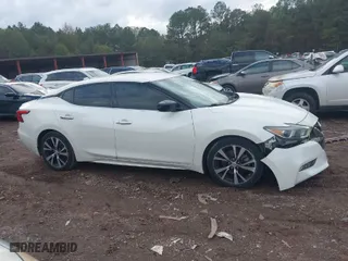 2018 Nissan Maxima SL with VIN 1N4AA6AP7JC389452, listed as a IAAI auction lot 40735392 with 120,076 mi miles. Bid and sale history available at carsss.com. Image 13.