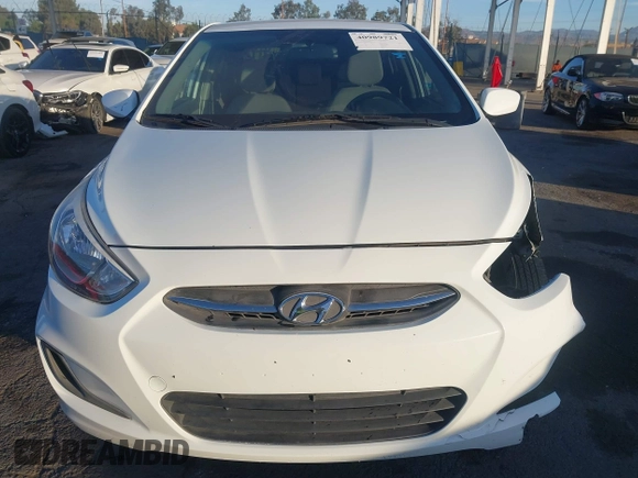 2016 Hyundai Accent SE z VIN KMHCT4AE0GU062891, wystawiony jako IAAI lot #40989721 z przebiegiem 128 457 mil mil oraz . Historia ofert i sprzedaży dostępna na DreamBid. Obrazek 13.