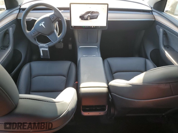 2024 Tesla Model Y with VIN 7SAYGDED4RF017614, listed as a Copart auction lot 88494625 with 11,209 mi miles and Salvage title. Bid and sale history available at DreamBid. Image 8.