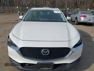 2022 Mazda CX-30 S Premium with VIN 3MVDMBDL7NM412263, listed as a IAAI auction lot 41779877 with 42,088 mi miles and . Bid and sale history available at carsss.com. Image 11.