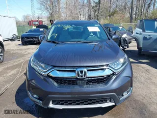 2019 Honda CR-V Touring with VIN 2HKRW1H96KH505447, listed as a IAAI auction lot 41876110 with 56,104 mi miles. Bid and sale history available at carsss.com. Image 12.