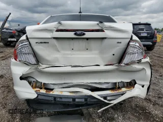 2012 Ford Fusion SE z VIN 3FAHP0HA1CR353093, wystawiony jako Copart lot #57113615 z przebiegiem 120 769 mil mil oraz Szkoda całkowita • Salvage title. Historia ofert i sprzedaży dostępna na DreamBid. Obrazek 6.