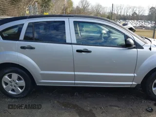 2008 Dodge Caliber SE with VIN 1B3HB28B48D502983, listed as a IAAI auction lot 41429571 with 185,487 mi miles and . Bid and sale history available at DreamBid. Image 13.
