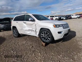 2017 Jeep Grand Cherokee Overland with VIN 1C4RJFCG7HC707767, listed as a Copart auction lot 82345154 with 96,374 mi miles and Salvage Title. Bid and sale history available at carsss.com. Image 14.