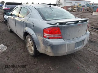 2009 Dodge Avenger SXT with VIN 1B3LC56B09N522736, listed as a IAAI auction lot 41195477 with 100,977 mi miles and . Bid and sale history available at DreamBid. Image 3.