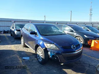 2011 Mazda CX-7 i Sport with VIN JM3ER2B57B0380836, listed as a IAAI auction lot 41589825 with 132,927 mi miles. Bid and sale history available at carsss.com. Image 1.
