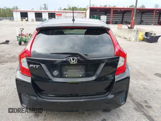 2016 Honda Fit LX with VIN JHMGK5H53GX020149, listed as a IAAI auction lot 42594205 with 183,414 mi miles and . Bid and sale history available at DreamBid. Image 16.