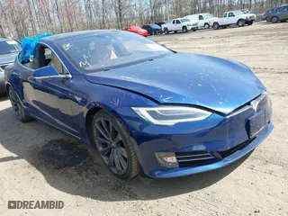 2016 Tesla Model S 90D with VIN 5YJSA1E20GF141040, listed as a IAAI auction lot 41784624 with 94,804 mi miles. Bid and sale history available at carsss.com. Image 1.