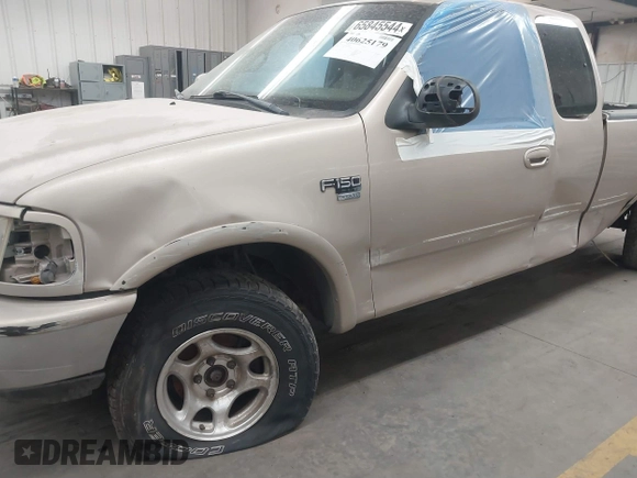1998 Ford F-150 with VIN 1FTZX18W6WKA83626, listed as a IAAI auction lot 40625179 with 343,403 mi miles and . Bid and sale history available at DreamBid. Image 6.