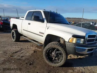 2002 Dodge Ram 2500 with VIN 3B7KF23672M273990, listed as a IAAI auction lot 41354174 with 198,542 mi miles. Bid and sale history available at carsss.com. Image 1.