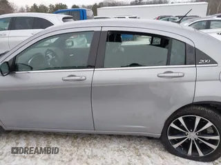 2013 Chrysler 200 Limited with VIN 1C3CCBCG2DN592782, listed as a IAAI auction lot 41471739 with 103,079 mi miles and . Bid and sale history available at DreamBid. Image 14.