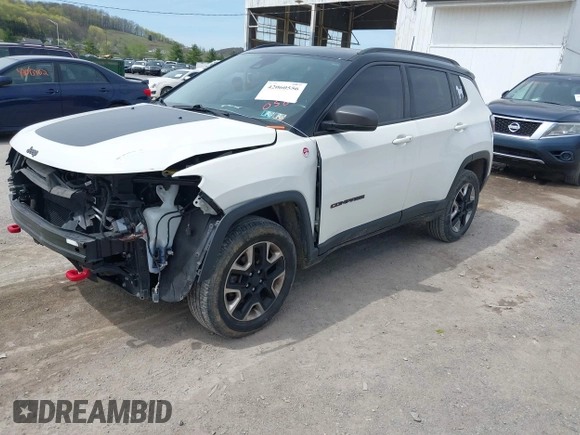 2017 Jeep Compass Trailhawk with VIN 3C4NJDDBXHT500588, listed as a IAAI auction lot 42060556 with 76,788 mi miles and . Bid and sale history available at DreamBid. Image 18.