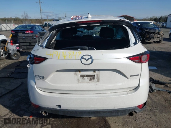 2020 Mazda CX-5 Grand Touring with VIN JM3KFBDM6L0751471, listed as a IAAI auction lot 41914849 with Not Provided miles and . Bid and sale history available at carsss.com. Image 16.