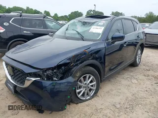 2023 Mazda CX-5 S Carbon Edition z VIN JM3KFBCM6P0251947, wystawiony jako IAAI lot #42286595 z przebiegiem 9 434 mil mil oraz . Historia ofert i sprzedaży dostępna na DreamBid. Obrazek 22.