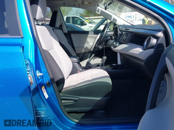 2016 Toyota RAV4 Hybrid XLE with VIN JTMRJREV5GD014170, listed as a IAAI auction lot 41822178 with 89,676 mi miles. Bid and sale history available at carsss.com. Image 5.