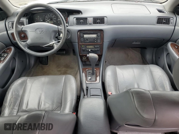 2000 Toyota Camry CE z VIN JT2BG28KXY0432024, wystawiony jako Copart lot #57057905 z przebiegiem 201 289 mil mil oraz Szkoda całkowita • Salvage title. Historia ofert i sprzedaży dostępna na DreamBid. Obrazek 8.