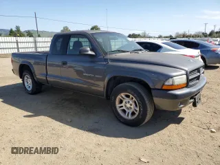 2002 Dodge Dakota z VIN 1B7GL32N62S551525, wystawiony jako Copart lot #48777025 z przebiegiem 91 438 mil mil oraz Czysty tytuł • Clean title. Historia ofert i sprzedaży dostępna na DreamBid. Obrazek 4.
