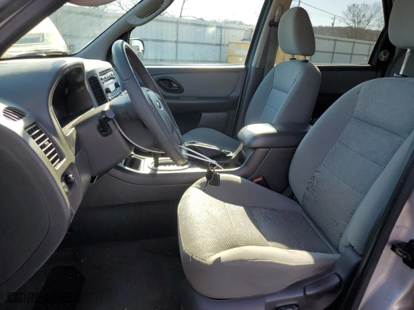 2005 Ford Escape XLT with VIN 1FMYU03155DA05427, listed as a Copart auction lot 50506675 with 142,130 mi miles and Salvage Title. Bid and sale history available at carsss.com. Image 7.