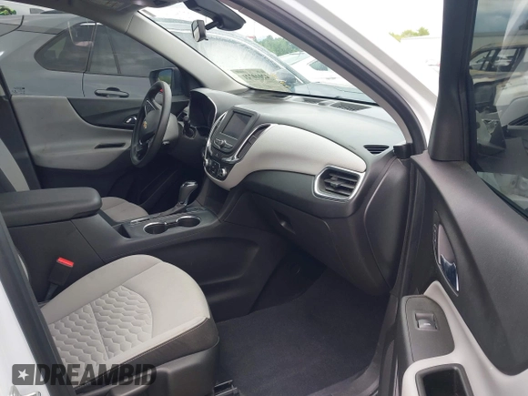 2020 Chevrolet Equinox LS z VIN 3GNAXSEV0LS648569, wystawiony jako IAAI lot #42010721 z przebiegiem 39 949 mil mil oraz . Historia ofert i sprzedaży dostępna na DreamBid. Obrazek 5.