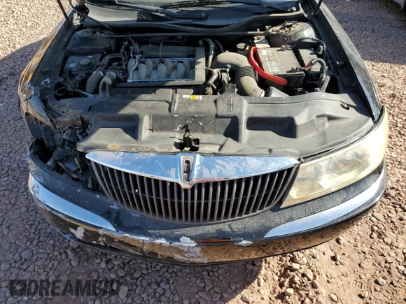 2001 Lincoln Continental with VIN 1LNHM97V61Y604213, listed as a Copart auction lot 52517535 with 112,391 mi miles and Salvage Title. Bid and sale history available at DreamBid. Image 12.
