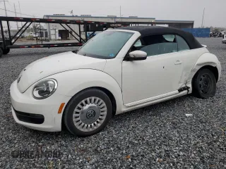 2013 Volkswagen Beetle 2.5L with VIN 3VW5P7AT7DM812320, listed as a Copart auction lot 86885814 with 118,416 mi miles and Salvage Title. Bid and sale history available at DreamBid. Image 1.