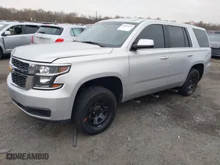 2018 Chevrolet Tahoe Commercial with VIN 1GNLCDEC0JR276911, listed as a IAAI auction lot 40809423 with 110,163 mi miles. Bid and sale history available at carsss.com. Image 2.