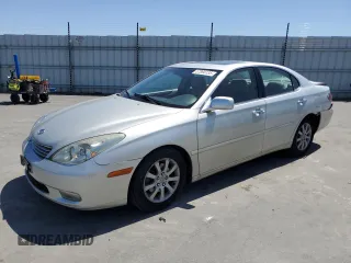 2002 Lexus ES 300 with VIN JTHBF30G420014345, listed as a Copart auction lot 57890135 with 153,695 mi miles and Salvage title. Bid and sale history available at DreamBid. Image 1.