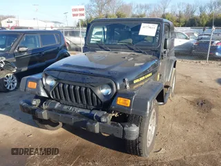 2006 Jeep Wrangler Sport with VIN 1J4FA49SX6P733671, listed as a IAAI auction lot 41779611 with 189,701 mi miles and . Bid and sale history available at carsss.com. Image 17.